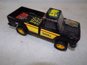 lot 37 image: Black Tonka Truck