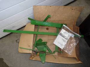 lot 104 image: Thatcher Bracket for John Deere Mower