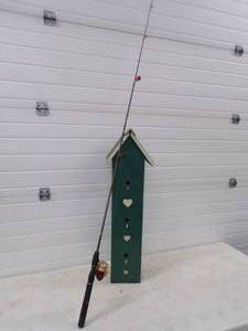 lot 109 image: Bird House and Fishing Rod and Reel