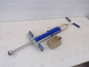 lot 118 image: Pogo Stick and Canteen