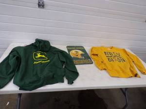 lot 120 image: 2 Sweatshirts and Plastic Sign