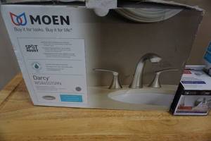 lot 18 image: Moen Model Darcy Bathroom Faucet Head, Toilet Paper Holder and Towel Hook
