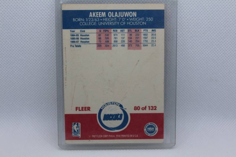 lot 103 image: Akeem Olajuwon 1987 Fleer No. 80 of 132