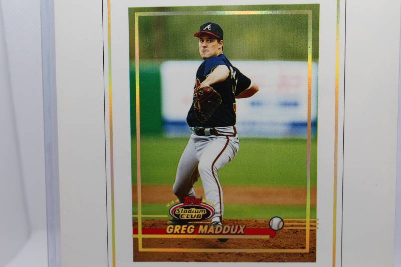 lot 12 image: Greg Maddux Topps Stadium Club Master Photo 1993