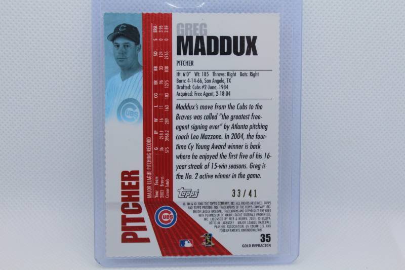 lot 86 image: Greg Maddux 2004 Pinnacle No. 35 Gold Refractor Numbered 3341