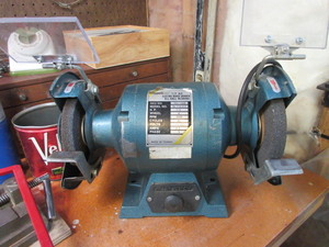 lot 504 image: MENARDS 12 HP ELECTRIC BENCH GRINDER