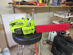 lot 507 image: POULAN CHAINSAW WITH 16 BLADEAND CHAIN SAW SHARPENER JIG