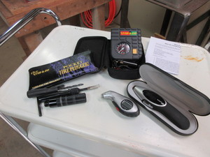 lot 536 image: HANDY MISC TIRE PRESSURE ACCESSORIES AND COMPRESSOR