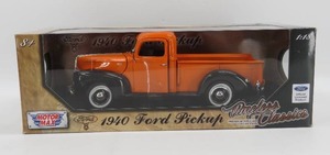lot 18 image: Motor Max 118 Scale 1940 Ford Pickup Orange NIB