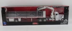 lot 23 image: New Ray 132 Peterbilt Flatbed Trailer wI-Beam Model 379 NIB