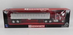lot 24 image: New Ray 132 Scale Kenworth W900 Frameless Dump Truck NIB