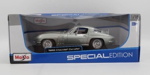 lot 57 image: Maisto 118 Scale 1965 Chevrolet Corvette Silver NIB