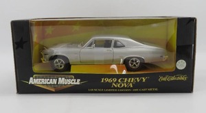 lot 61 image: Ertl American Muscle 118 Scale 1969 Chevy Nova Silver Diecast