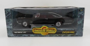 lot 67 image: Ertl American Muscle 118 Scale 1966 Pontiac GTO Black Diecast