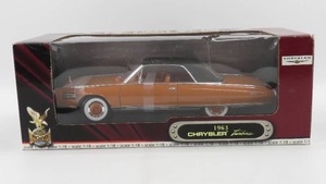 lot 69 image: Road Signature 118 Scale 1963 Chrysler Turbine Spice Orange NIB