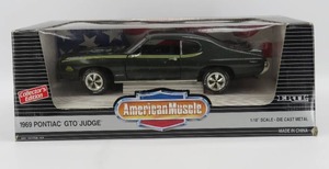 lot 70 image: American Muscle 118 Scale 1969 Pontiac GTO Judge Midnight Green