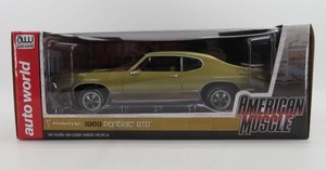 lot 245 image: Auto World 118 Scale 1969 Pontiac GTO Gold Diecast NIB