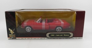 lot 95 image: Road Signature 1969 Corvair Monza Red Convertible 118 Scale NIB