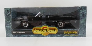 lot 119 image: Ertl American Muscle 118 Scale 1969 Plymouth GTX Convertible Black NIB