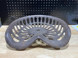 lot 23 image: Vintage Champion Tractor Seat