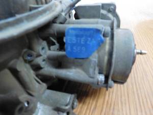 lot 54 image: 3 Carburetors with Extra Parts and Manual