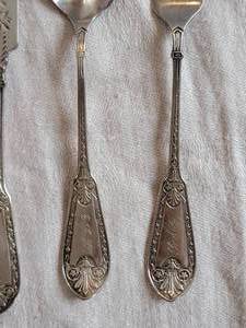 lot 21 image: Initialed G. F. W. Sterling Silver place setting 49 Grams