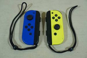 lot 7 image: Nintendo Switch Joy-Cons -Neon Blue & Yellow