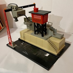 lot 26 image: Lionel Oil Drum Loader