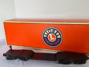 lot 46 image: Lionel Depressed Center Flatcar with Back Shop