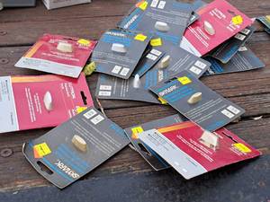 lot 950 image: Lot of (18) Assorted Replacement Knobs (in original packaging)