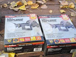 lot 960 image: Lot of (2) Heath Zenith Reflex 4-In-1 Motion Sensor Light Control (in original packaging)