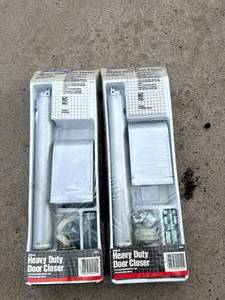 lot 25 image: 2 New Heavy Duty Door Closers