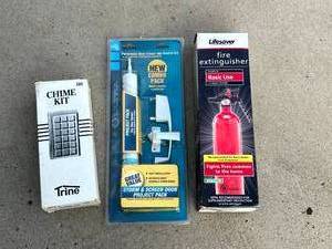 lot 46 image: New StormScreen Door Handle Kit, Fire Extinguisher & Chime Kit