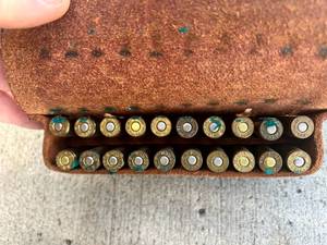 lot 111 image: 25-06 Remington Shells in Leather Case