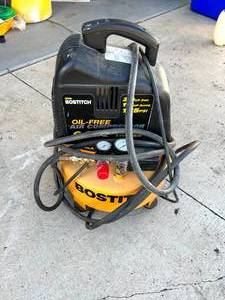 lot 150 image: Bostitch Air Compressor with Extra Hose & Fittings