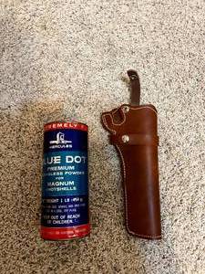 lot 173 image: Pistol Holster & Smokeless Powder
