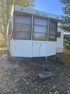 1989 34ft Camper Trailer AC, fridge, stove ,Queen Bed  all work a year ago was not used this season