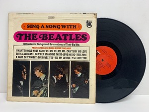 lot 10 image: Sing a Song With The Beatles Vinyl Record