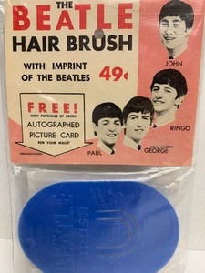 lot 49 image: The Beatle Hair Brush Sealed in Original Packaging