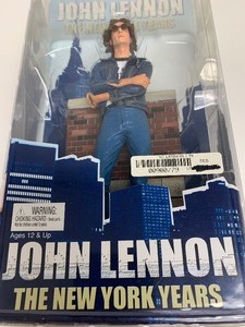 lot 56 image: Factory Sealed John Lennon The New York Years Figurine