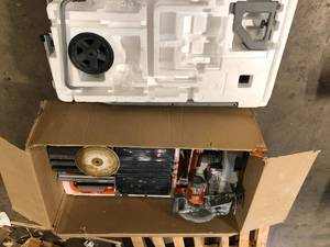 lot 12 image: RIDGID 15 Amp 10 in. Wet Tile Saw with Portable Stand  Customer Returns See Pictures