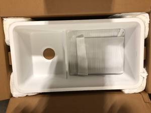 lot 22 image: KOHLER Cairn 18-516 in. x 27-12 in. x12-58 in. Composite Undermount Utility Sink in Matte White  Customer Returns See Pictures