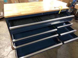 lot 25 image: Husky 52 in. W x 25 in. D Standard Duty 9-Drawer Mobile Workbench Cabinet with Solid Wood Top in Gloss Blue  Customer Returns See Pictures