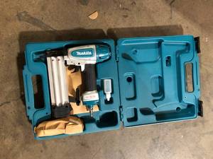 lot 34 image: Makita Pneumatic 18-Gauge 2 in. Brad Nailer  Customer Returns See Pictures