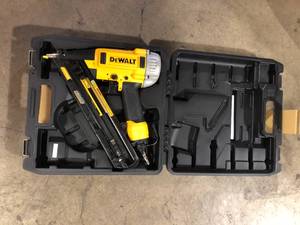 lot 39 image: DEWALT Pneumatic 15-Gauge DA Nailer    Customer Returns See Pictures