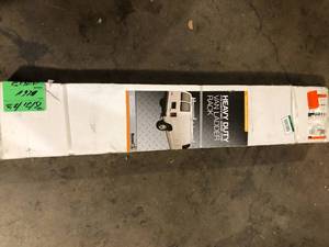 lot 41 image: Buyers Products Company Heavy Duty Van Ladder Rack in White Customer Returns See Pictures