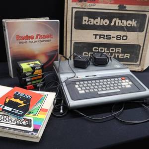 lot 49 image: EARLY GAMER COMPUTER IN ORIGINAL BOX