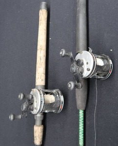 lot 71 image: PAIR OF FISHING RODS AND REELS