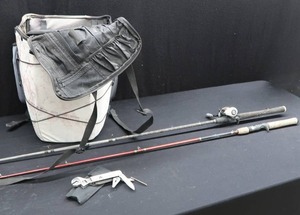 lot 72 image: HARD SIDE HUNTING BACKPACK WITH AWESOME MULTI TOOL AND ROD AND REEL