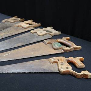 lot 91 image: VERY VINTAGE HAND SAWS